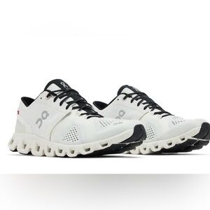 On Running  cream  and Black Sneakers